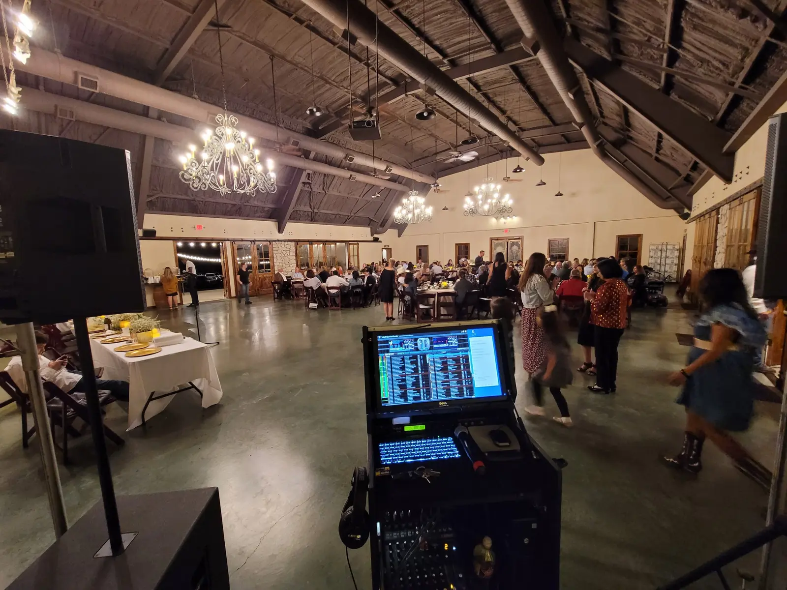 ThatDjGuy's professional control rack operating in a full reception venue