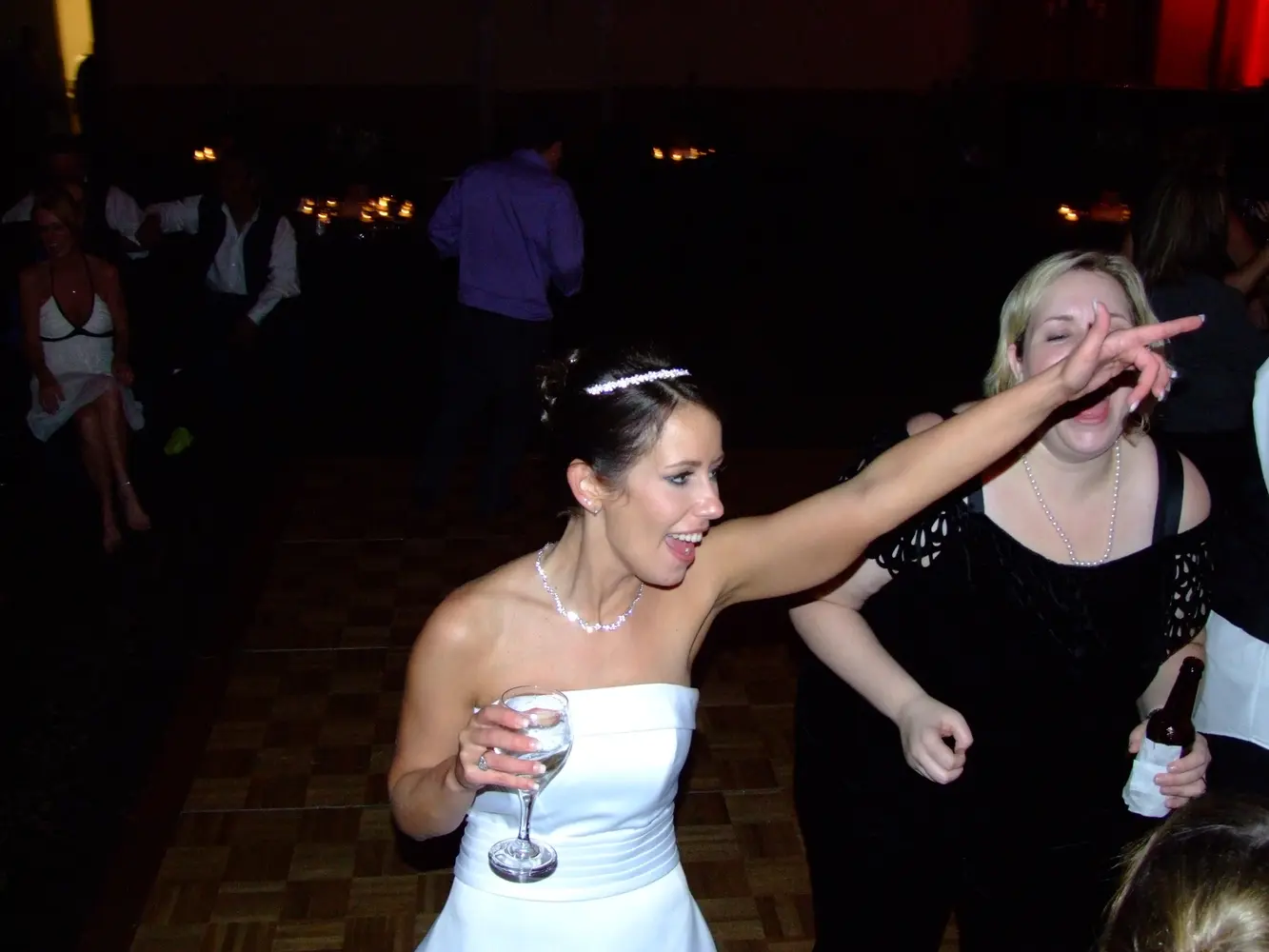A bride celebrating with her guests during the reception